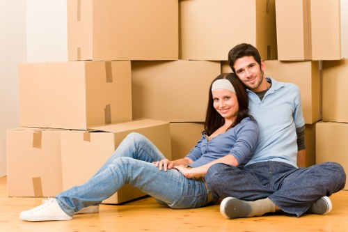 Professional movers loading a truck with household items